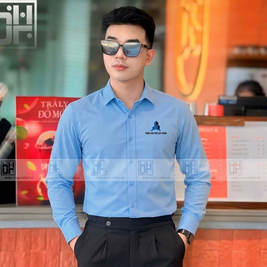                              Mẫu áo sơ mi công ty xây dựng màu xanh nhạt 