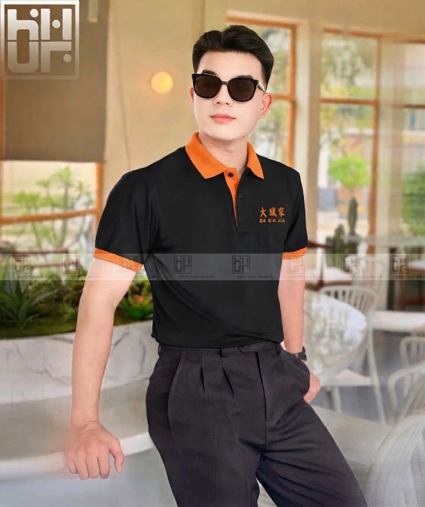 Mẫu áo polo nhà hàng màu đen phối cam đẹp