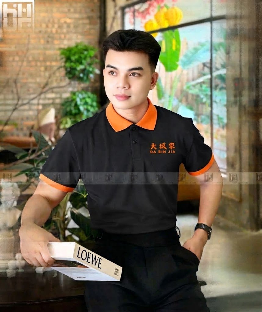 Mẫu áo đồng phục nhà hàng màu đen phối cam